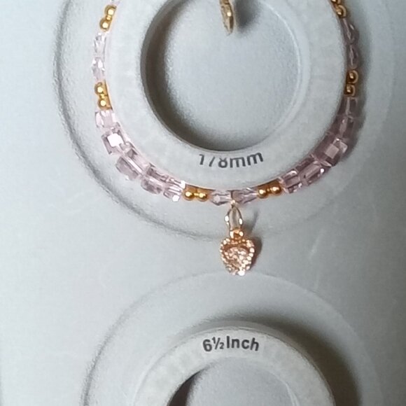 Homemade beaded glass bracelet with charms Size 7. Color Pink - Picture 2 of 2